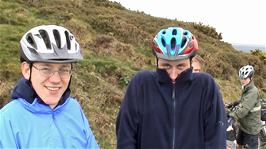 Tao is not feeling cold at all after lunch on the coast path from Hunter's Inn to Woody Bay